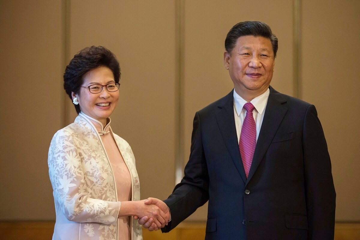 Xi Hails Hong Kong’s ‘Patriots Only’ Election in Meeting With Lam