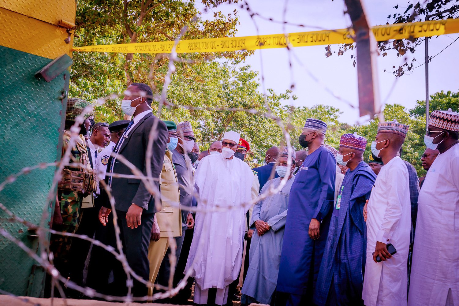 Nigerian President Muhammadu Buhari (centre, in white) visited the Kuje prison in Abuja, where the Islamic State of West Africa Province (ISWAP) recently orchestrated an attack that led to the escape of over 800 inmates, including 63 Boko Haram militants.