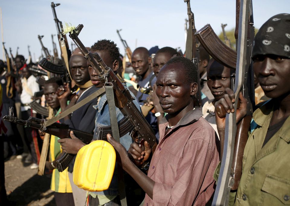 Nuer fighters holds their weapons in Upper Nile State, South Sudan February 10, 2014.