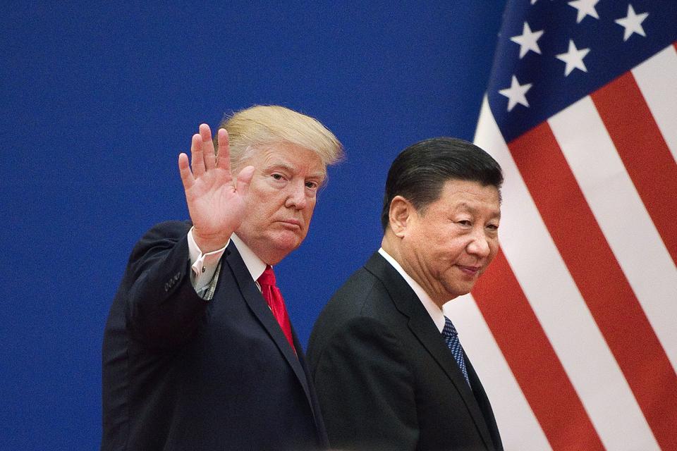 Then-US President Donald Trump (L) and Chinese President Xi Jinping in November 2017.