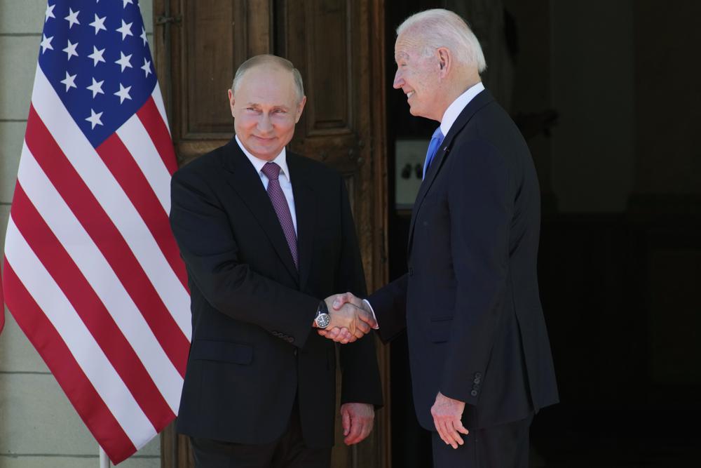 Russian President Vladimir Putin (L) with US President Joe Biden