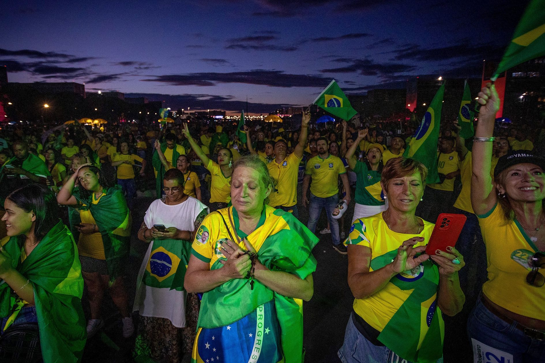 Jair Bolsonaro’s supporters await the final vote count in Brasilia