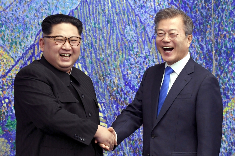 In this photo from April 27, 2018, North Korean leader Kim Jong Un (L) poses with South Korean President Moon Jae-in inside the Peace House at the South Korean border village of Panmunjom in the Demilitarized Zone.