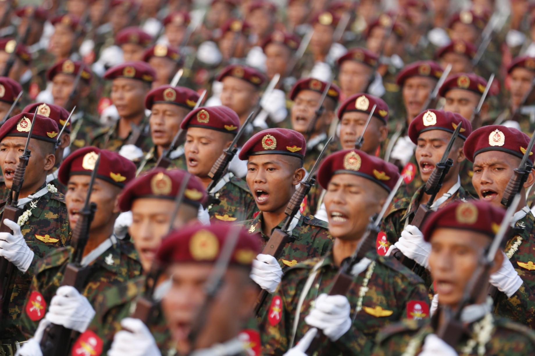 Myanmar regime soldiers march during a ceremony to mark Armed Forces Day in March 2018 