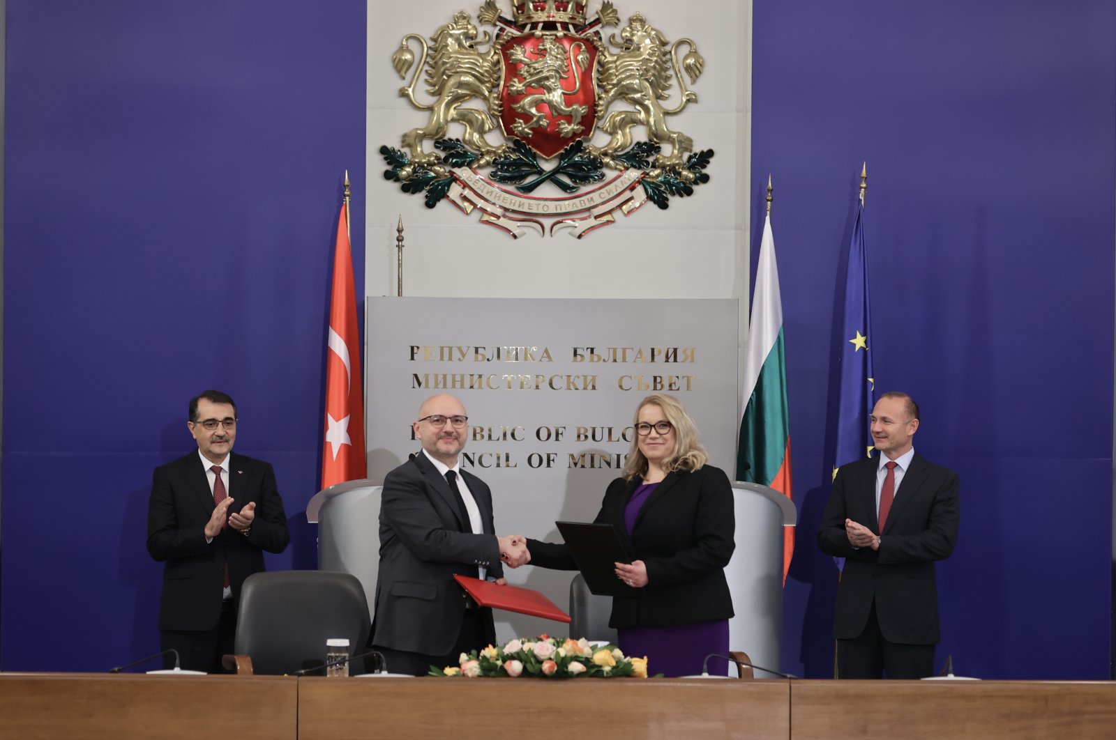 Turkey's Energy and Natural Resources Minister Fatih Dönmez (L) and his Bulgarian counterpart Rossen Hristov (R) are seen during a signing ceremony for a long-term natural gas agreement, in Sofia.