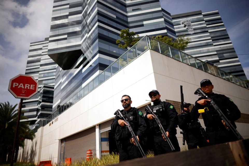 Brazilian  prison officers take position in front of federal police headquarters during an action by Federal Police and agents of the Civil Police of Brasilia